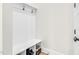 Hallway with built-in storage, coat hooks, and access to other rooms at 67 Comfort Ct, Fuquay Varina, NC 27526