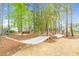 Relaxing hammock park with comfortable hammocks surrounded by tall trees, perfect for unwinding and enjoying nature at 67 Comfort Ct, Fuquay Varina, NC 27526