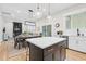 Open floor plan with kitchen, dining, and living areas at 67 Comfort Ct, Fuquay Varina, NC 27526