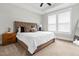Cozy main bedroom with a comfortable bed, ample natural light, and neutral decor at 67 Comfort Ct, Fuquay Varina, NC 27526