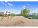 Community playground with swings and slide in a Gathering friendly community at 67 Comfort Ct, Fuquay Varina, NC 27526