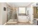 This bathroom has a shower and tub at 6925 Rex Rd, Holly Springs, NC 27540