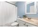 Light and airy bathroom with shower and vanity at 6925 Rex Rd, Holly Springs, NC 27540
