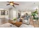 Open living space combining the living room and kitchen in an open concept design at 6925 Rex Rd, Holly Springs, NC 27540