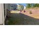 A spacious backyard with a gentle slope, perfect for outdoor activities and relaxation in nature at 705 Blue Pointe Path, Apex, NC 27523