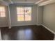 Dining area featuring hardwood floors and natural light at 705 Blue Pointe Path, Apex, NC 27523