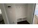 Hallway with coat hooks and a built-in bench with cubbies perfect for keeping things tidy and organized at 705 Blue Pointe Path, Apex, NC 27523