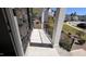 Inviting front porch with stone accents and black railings at 705 Blue Pointe Path, Apex, NC 27523