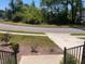 View from the porch of the front yard and street at 705 Blue Pointe Path, Apex, NC 27523
