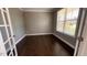 Office featuring dark hardwood floors and natural light at 705 Blue Pointe Path, Apex, NC 27523