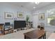 Room featuring neutral paint, white trim, carpet, and a window at 712 Portstewart Dr, Cary, NC 27519