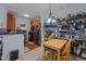 Charming dining area with table and chairs complemented by a view of the kitchen at 712 Portstewart Dr, Cary, NC 27519