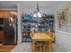 Inviting dining area perfect for meals with stainless steel refrigerator in view at 712 Portstewart Dr, Cary, NC 27519