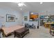 Open floor plan with kitchen and living area at 712 Portstewart Dr, Cary, NC 27519