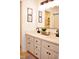 Bathroom with double vanity, modern fixtures, and ample storage within its classic design at 738 Aspenwood Dr, Graham, NC 27253