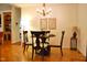 Well-lit dining area with elegant table and chairs at 738 Aspenwood Dr, Graham, NC 27253