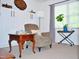 Inviting living room with chair, stylish side tables, modern furnishings, and ample natural light at 738 Aspenwood Dr, Graham, NC 27253