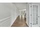 Hallway leading into a bright living room with ample light at 745 Aristocrat Ln, Knightdale, NC 27545