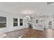 Bright open kitchen featuring stainless steel appliances, granite countertops, and modern lighting at 745 Aristocrat Ln, Knightdale, NC 27545