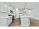 Modern kitchen with stainless steel appliances and a spacious center island at 745 Aristocrat Ln, Knightdale, NC 27545