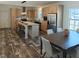 Eat-in kitchen with stainless steel appliances, a large island, and dining area at 765 Whitley Rd, Middlesex, NC 27557