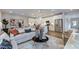 Cozy living room featuring a modern kitchen, stainless steel appliances, and stylish decor at 8724 Wardle Ct, Wake Forest, NC 27587