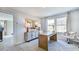 Well-lit home office with neutral walls, plush carpeting, and a large window at 8724 Wardle Ct, Wake Forest, NC 27587