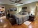Inviting bedroom with hardwood floors, a queen-size bed, and cozy decor at 901 Vandora Ave, Garner, NC 27529