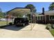 Attached carport providing covered parking and protection from the elements at 901 Vandora Ave, Garner, NC 27529