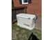 A Generac backup power generator next to a brick home and wooden fence at 901 Vandora Ave, Garner, NC 27529