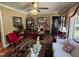 Inviting living room featuring hardwood floors, elegant furnishings, and plenty of natural light at 901 Vandora Ave, Garner, NC 27529