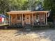 Charming outbuilding adorned with rustic decor, offering a unique and inviting space at 901 Vandora Ave, Garner, NC 27529