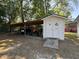 Outbuilding with covered parking area, and ramped entry at 901 Vandora Ave, Garner, NC 27529