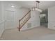 Spacious carpeted basement area with access to the upper level at 497 Summerwalk Cir # 497, Chapel Hill, NC 27517