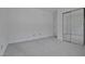 Bedroom offering neutral carpet, and a mirrored door closet at 497 Summerwalk Cir # 497, Chapel Hill, NC 27517
