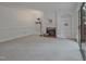 Cozy living room featuring a fireplace, built-in shelves and sliding glass door to the patio at 497 Summerwalk Cir # 497, Chapel Hill, NC 27517