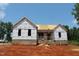 New home under construction with brick foundation on a sunny day at 95 Autumnwood Ln, Spring Hope, NC 27882