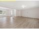 This living room features hardwood floors and an open layout with lots of natural light at 95 Autumnwood Ln, Spring Hope, NC 27882