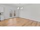 Bright dining area with French doors leading to an outdoor balcony at 95 Leisure Ln # 9, Louisburg, NC 27549