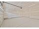 An unfinished two car garage with concrete floor at 95 Leisure Ln # 9, Louisburg, NC 27549