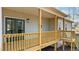 Wooden porch with railing at 95 Leisure Ln # 9, Louisburg, NC 27549