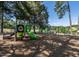 Community playground with swings, slides, and climbing structures for enjoyment at 100 Winterberry Ln, Holly Springs, NC 27540