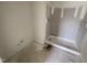A bathroom under construction, featuring white walls, and a new shower at 1031 Mountain Crown St, Durham, NC 27703