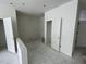 An interior room with white walls, ceilings, and trim with an open doorway at 1031 Mountain Crown St, Durham, NC 27703