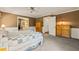 Comfortable bedroom with connecting office space and light brown walls at 10609 Lowery Dr, Raleigh, NC 27615
