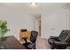 Home office featuring a work desk, office chair, and storage at 10609 Lowery Dr, Raleigh, NC 27615