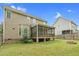 Backyard featuring a firepit and a covered porch at 11 Glen Valley Ct, Angier, NC 27501
