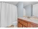 Bathroom featuring a vanity with light countertops and a shower with patriotic curtain at 11 Glen Valley Ct, Angier, NC 27501