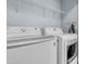 Laundry room featuring an LG washer and dryer with wire shelving at 11 Glen Valley Ct, Angier, NC 27501