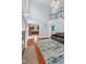 The open-concept home has hardwood floors, a fireplace and an open doorway to the kitchen at 11 Glen Valley Ct, Angier, NC 27501